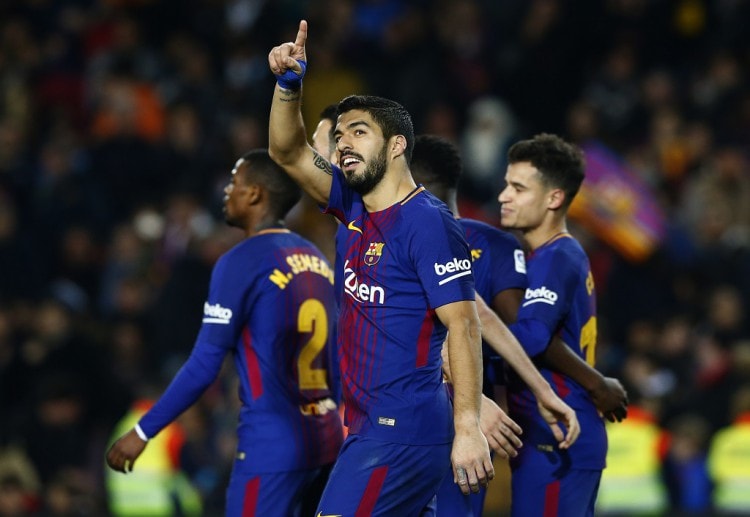 To the delight of Spanish sports betting fans, Luis Suarez scores a hat-trick to lead Barcelona against Girona