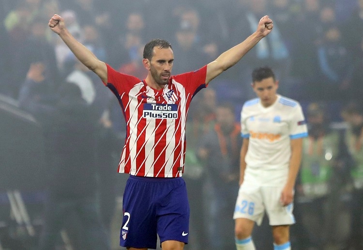 Diego Godin and Atletico Madrid look to attract football bets in their favour when they face Real Madrid