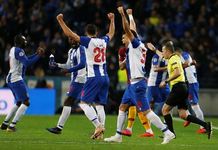 Alex Telles converts an extra-time penalty to send Porto through to the next round of the Champions League