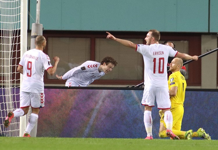 Andreas Skov Olsen celebrates with his teammates after scoring a brace during the World Cup 2022 qualifiers