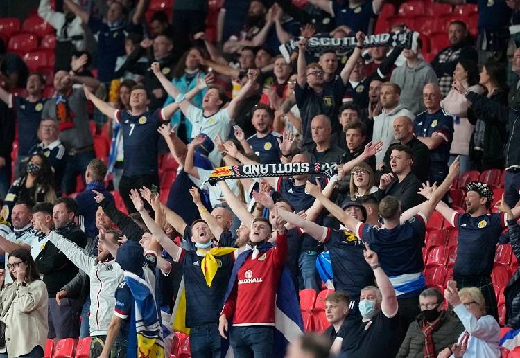 Scotland fans celebrate after a 0-0 draw against England in Euro 2020